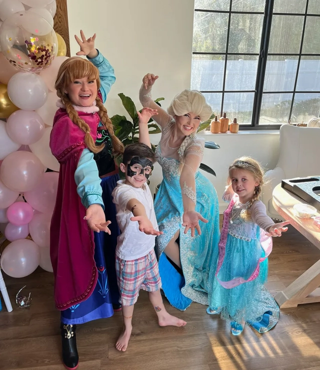 anna and elsa party with a boy and girl