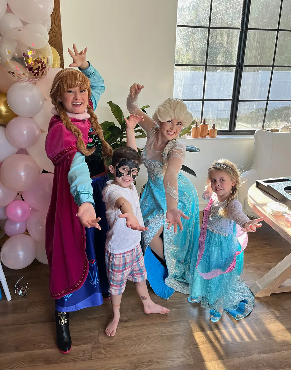 anna and elsa party with a boy and girl