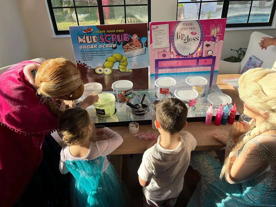 anna and elsa party with kids at fun stations mud scrub and lip gloss