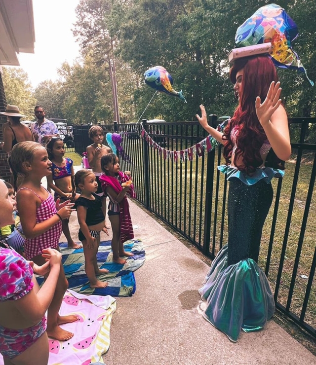 ariel princess training with children at party