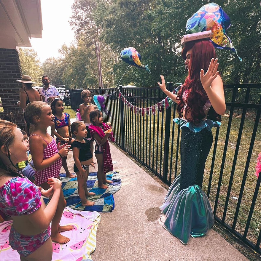 ariel princess training with children at party