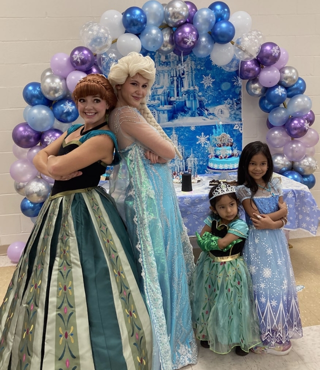 snow sisters and happy snowman at birthday party