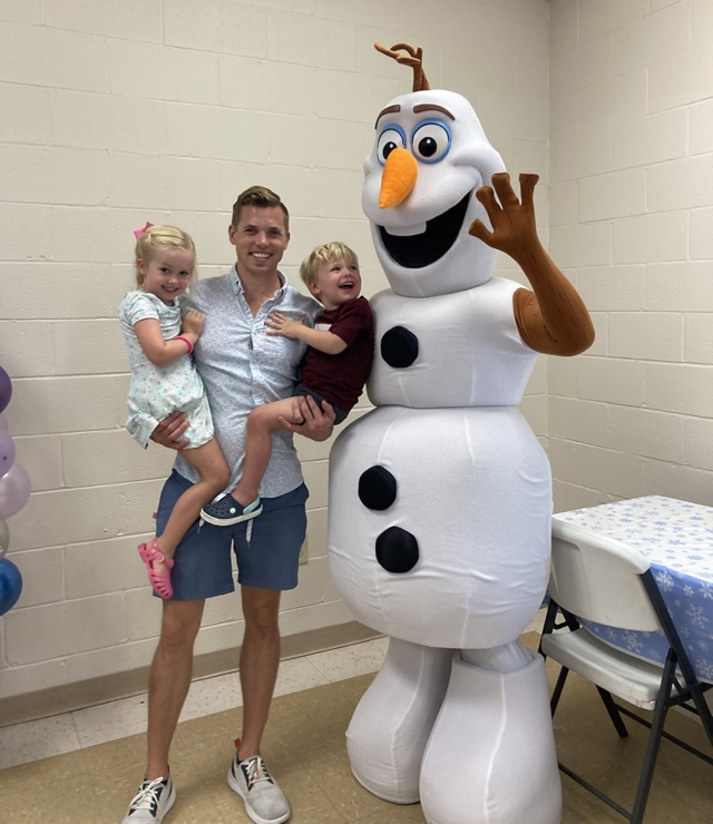 snow sisters and happy snowman at birthday party
