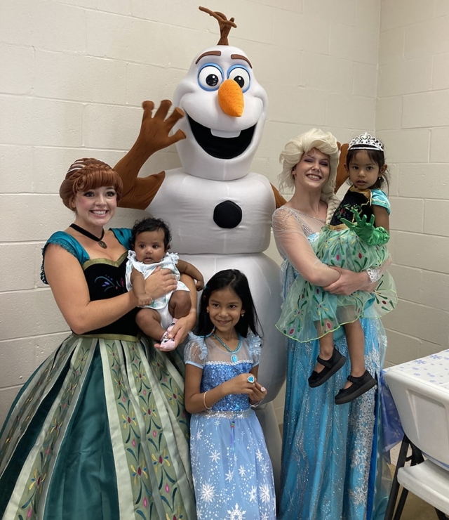 snow sisters and happy snowman at birthday party