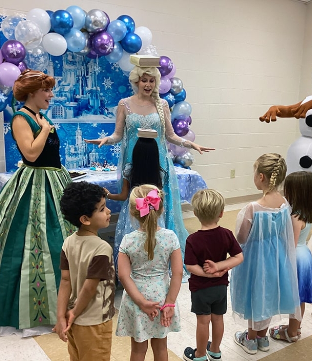 snow sisters and happy snowman at birthday party